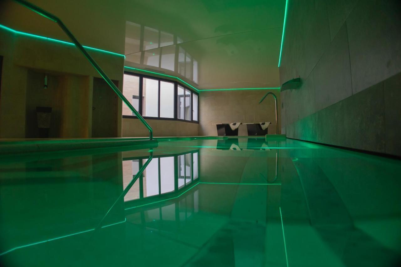 Oikos Apartamentos Turisticos โมเนสเตริโอ ภายนอก รูปภาพ