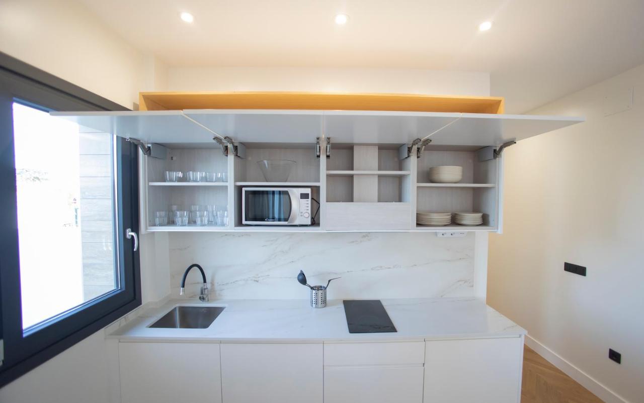 Oikos Apartamentos Turisticos โมเนสเตริโอ ภายนอก รูปภาพ