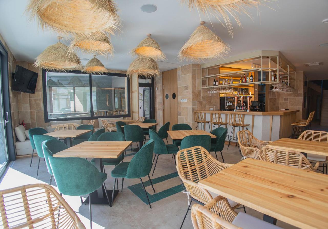 Oikos Apartamentos Turisticos โมเนสเตริโอ ภายนอก รูปภาพ