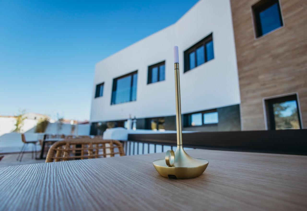 Oikos Apartamentos Turisticos โมเนสเตริโอ ภายนอก รูปภาพ